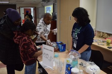 Middle school students engage in hands-on STEM activities at ϲʿ's Bronx campus at the Spring Open House for the Verizon Innovative Learning STEM Achievers Program